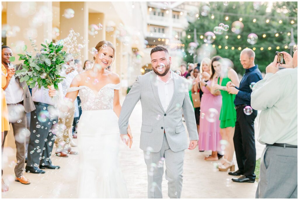 Fun Bubble Exit at Grand National Wedding | Opelika AL Photography by Amanda Horne