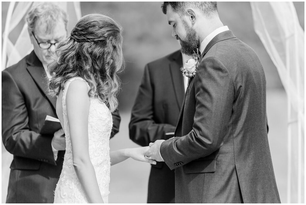 Ring exchange | Auburn Alabama Wedding | by photographer Amanda Horne
