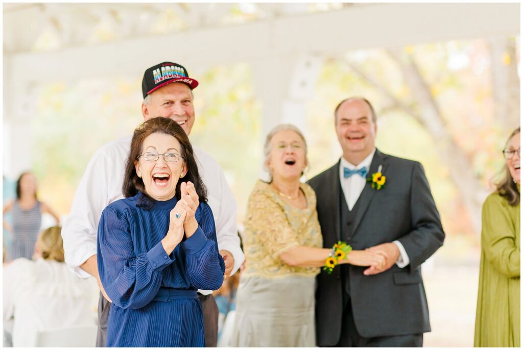 Laughing guests at Kiesel Park Wedding Reception| Auburn Alabama | by photographer Amanda Horne