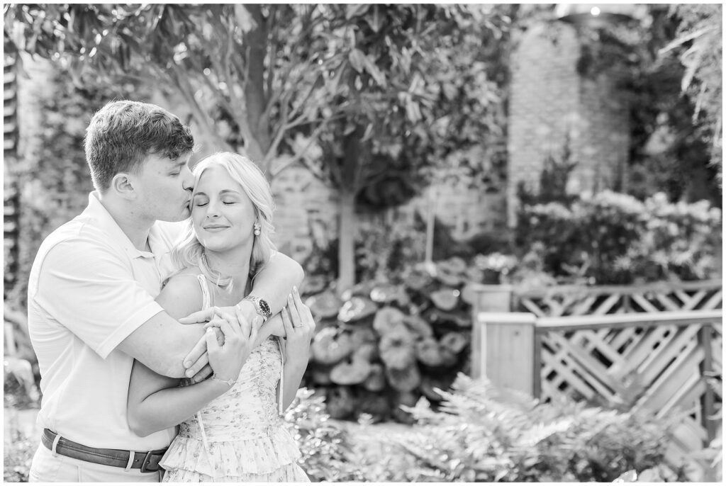 Black and White image of Engaged couple embracing | Alabama Wedding Photographer Amanda Horne