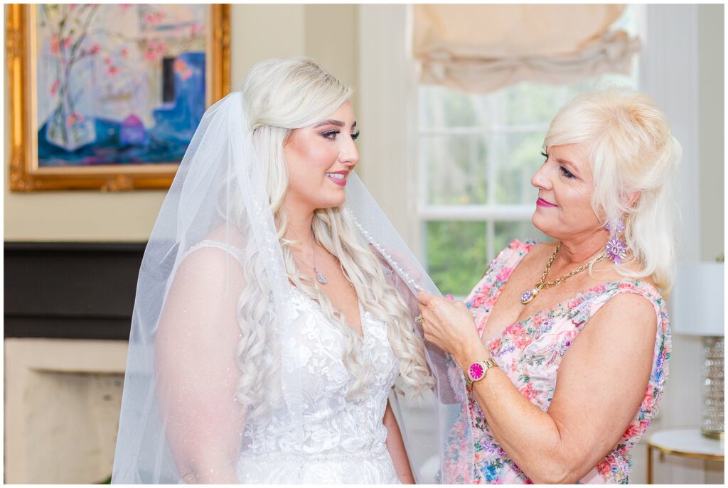 Bride's mother adjusts bride's veil at the Elms of Coosada | Central Alabama Wedding Photographer Amanda Horne