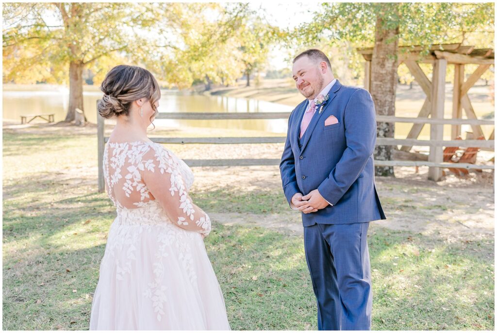 First look with groom at December wedding | The Farm at Lullwater wedding venue in Opelika Alabama | AL Wedding Photographer Amanda Horne