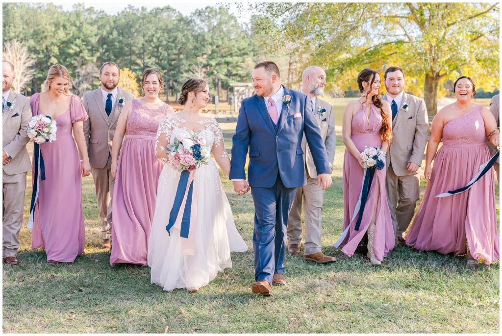 Bride and groom walk with wedding party | Alabama Wedding Photographer Amanda Horne