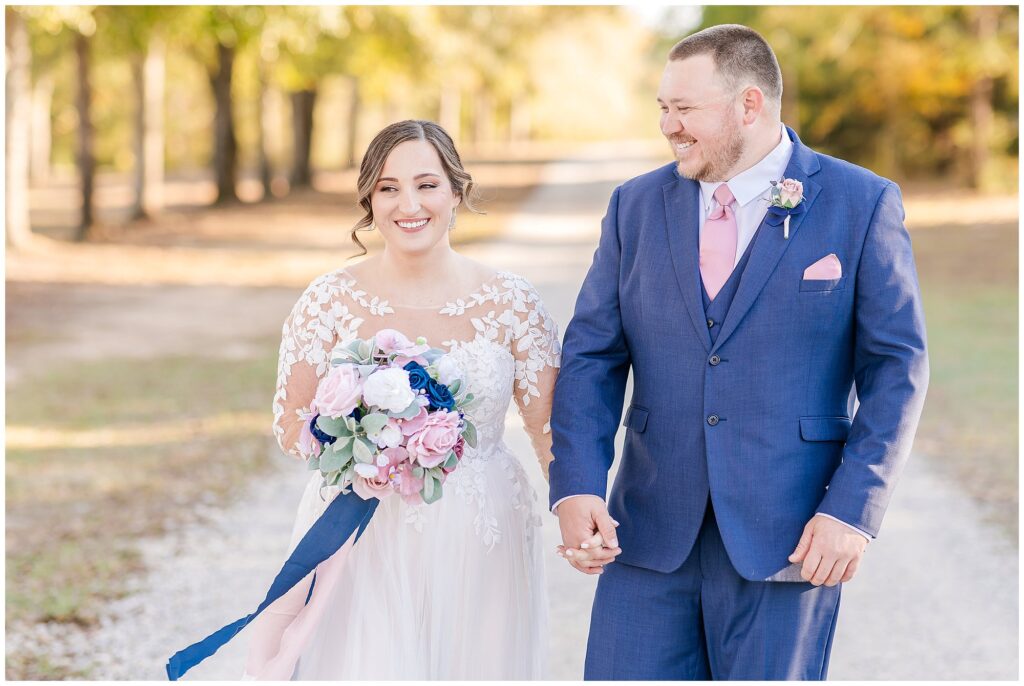 Bride and groom walking together | Alabama Wedding Photographer Amanda Horne