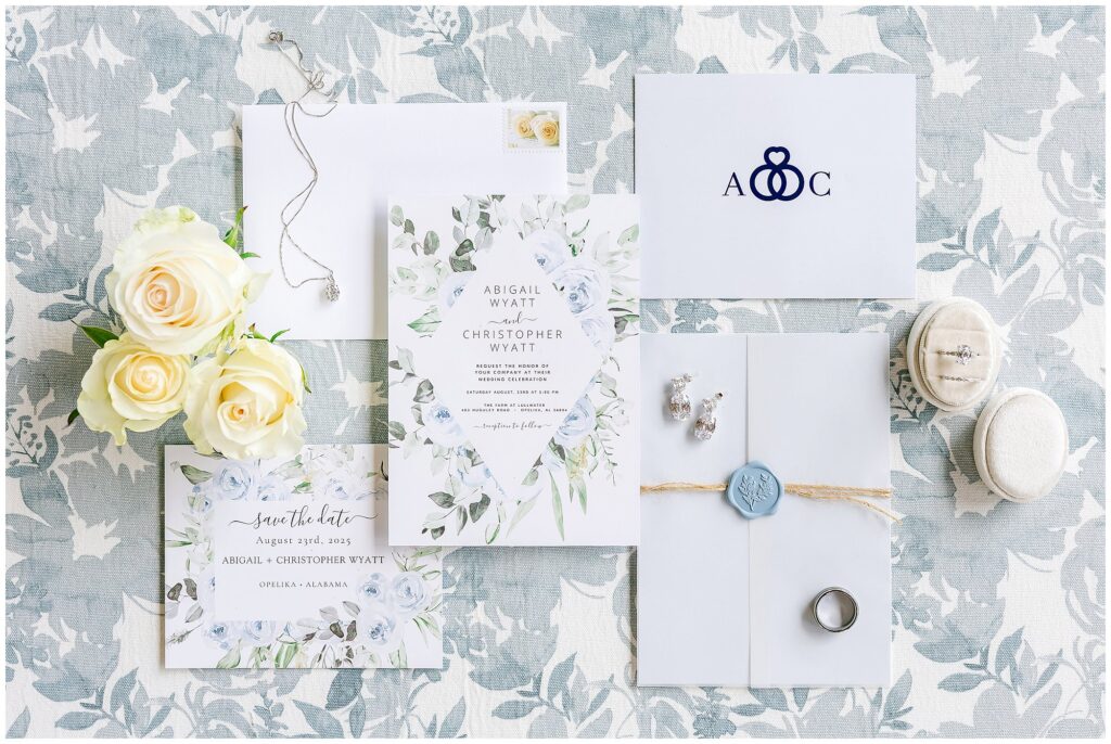 Wedding invitation suite with floral accents at The Farm at Lullwater