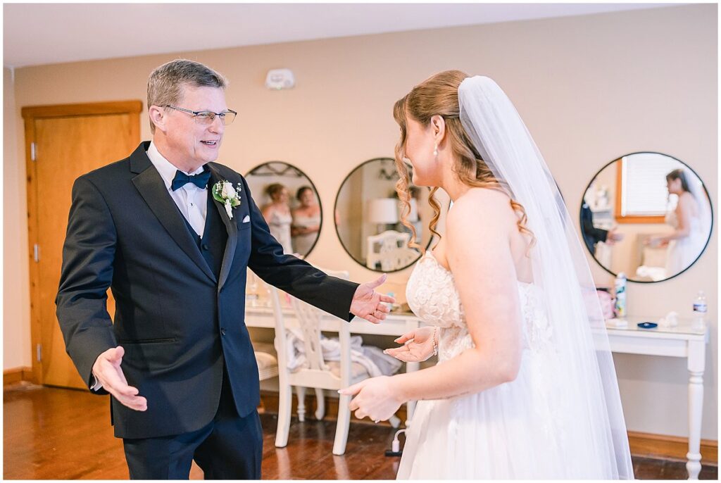 Bride and her father in a quiet moment before the ceremony
