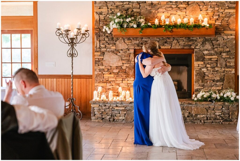 Bride and her mother dancing at an Oakhurst wedding reception
